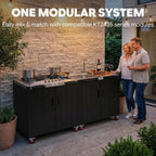feasto modular outdoor kitchen island with 5-burner gas shown in use