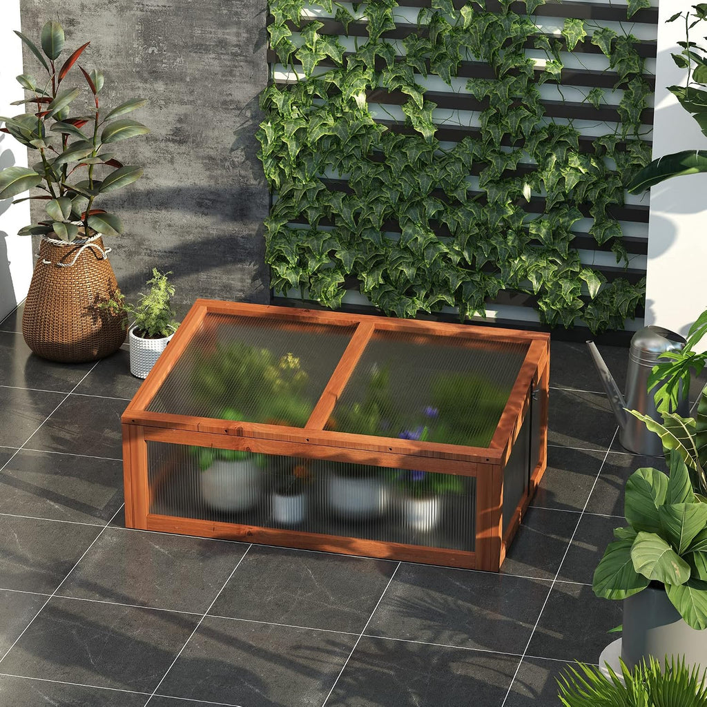 outsunny wooden framed polycarbonate cold frame greenhouse for shown in use