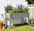 raised garden bed with legs, 48×24×30 cedar wood shown in use