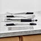 hexclad 8pc bbq tool set with spatula, tongs shown in use