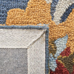 SAFAVIEH Blossom Collection Runner Rug - 2'3" x 6', Navy & Multi, Handmade Wool, Ideal for High Traffic Areas in Living Room, Bedroom (BLM401N)