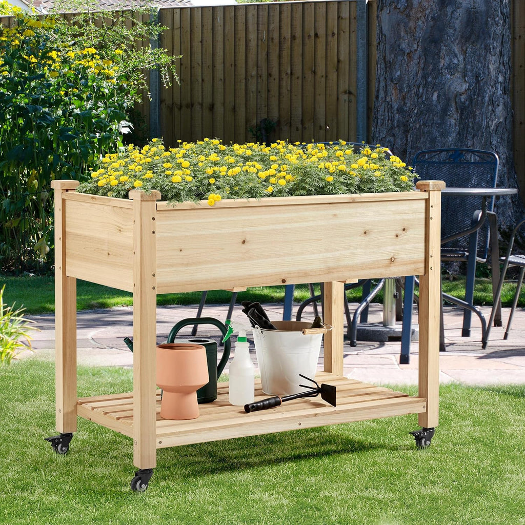 yaheetech raised garden bed with wheels 42x23x33in wooden shown in use